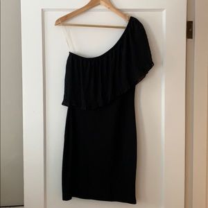 Black one shoulder dress with flirty detailing!